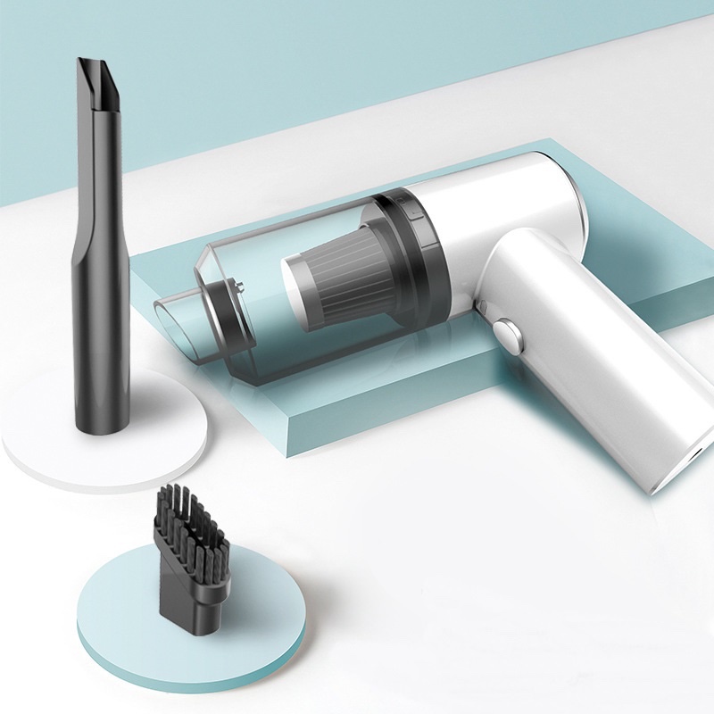 Fourfold Vortex cordless handheld vacuum in white, a long nozzle and a small brush beside it